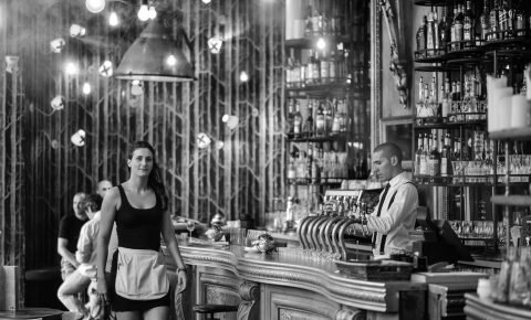 Barman And Waitress In Old Style Cafe In Paris Using an ITSM solution can help deal with any possible frustrations for retail and hospitality industry employees